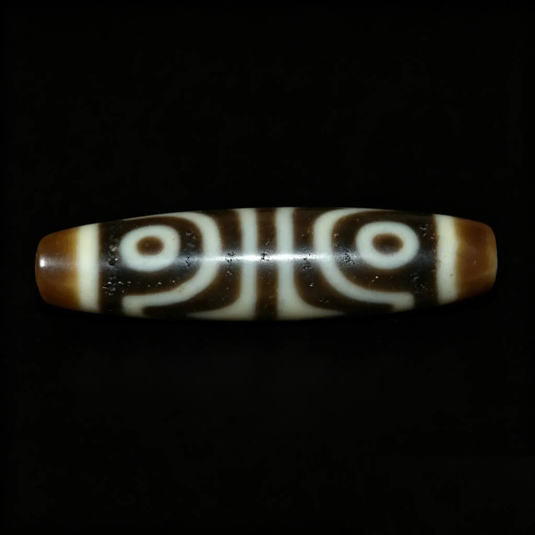 4 Eyes Dzi Bead Meaning: Benefits, Symbolism & How to Use
