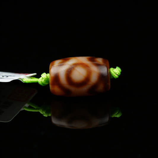 Backing 3 eyes Dzi Bead Meaning: Benefits, Symbolism & How to Use