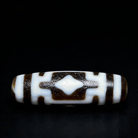 Cross Buddha Dzi Bead Meaning: Benefits, Symbolism & How to Use