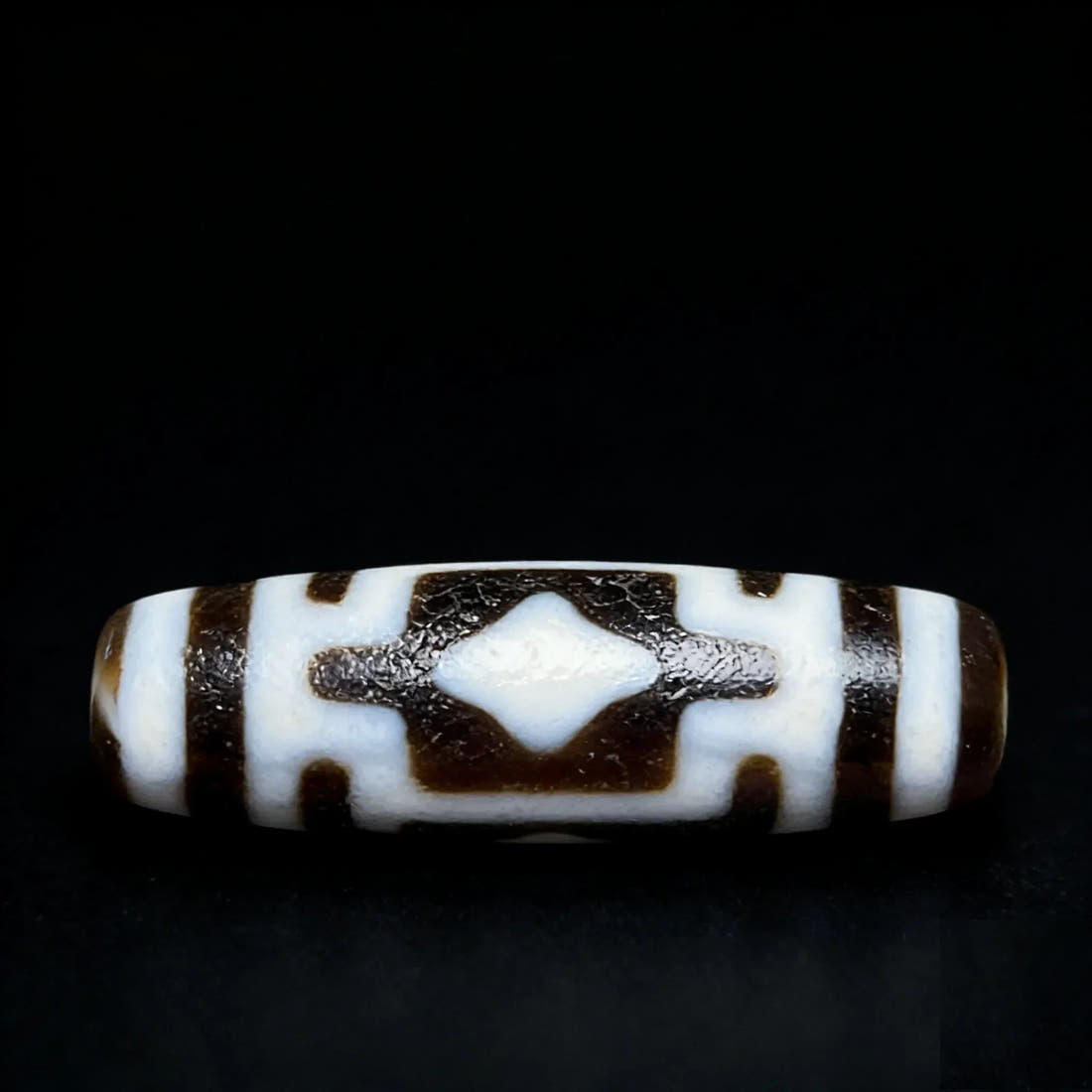 Cross Buddha Dzi Bead Meaning: Benefits, Symbolism & How to Use