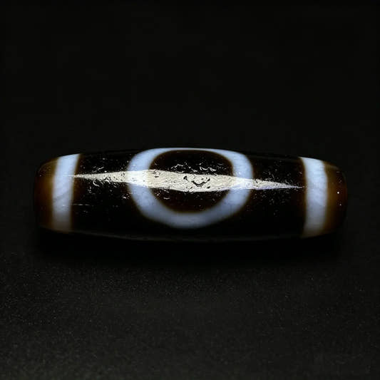 Sun and Moon Dzi Bead Meaning: Benefits, Symbolism & How to Use
