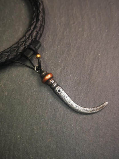 Wolf Tooth Amulet 1.77" - Tibetan Buddhist amulet, close-up detail