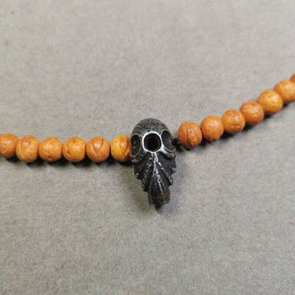 Mala Guru Bead, Skull Shape T-drilled 3-Hole Bead - Tibetan Buddhist mala beads, close-up detail