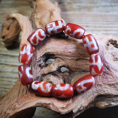 Fire Agate Dzi Bead Bracelet - Tibetan Buddhist mala beads, detailed view