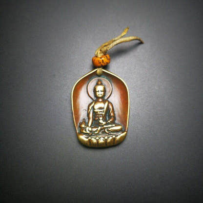Buddhist Protective Pendant,Shakyamuni Gautama Amulet - Tibetan Buddhist amulet, close-up detail