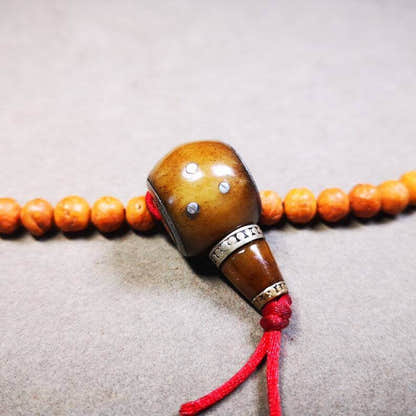 Guru Bead, T-drilled 3-Hole Bead - Tibetan Buddhist art, close-up detail