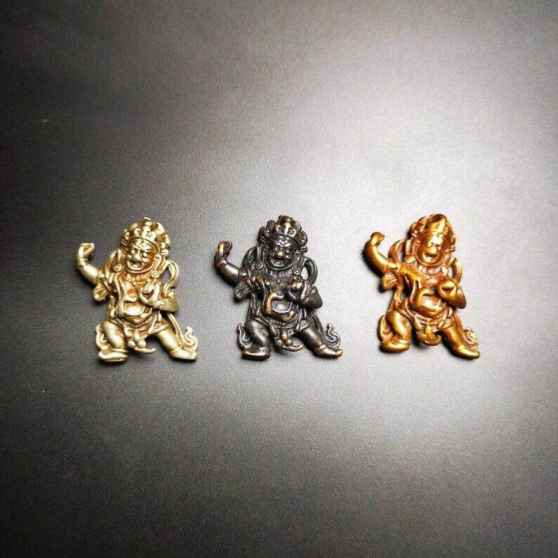 Statue,Small Vajrapani Amulet - Tibetan Buddhist amulet, close-up detail