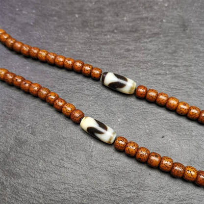 Tiger Tooth Dzi Spacer Marker Beads 0.32" - Tibetan dzi bead, detailed view