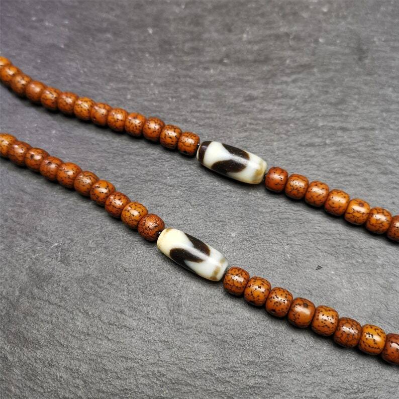 Tiger Tooth Dzi Spacer Marker Beads 0.32" - Tibetan dzi bead, detailed view
