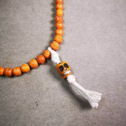 Yak Bone Carved Skull Prayer Bead Pendant,Bead Counter Clip Amulet for Mala - Tibetan Buddhist mala beads, front view
