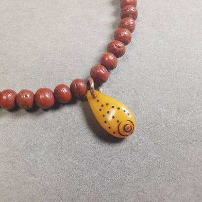 Yak Bone Bead Counter Pendant,Mani Jewel Amulet for Mala - Tibetan Buddhist mala beads, front view