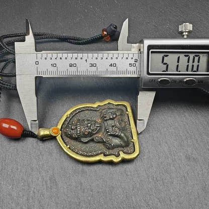 Drashi Lhamo Amulet, 52 - Tibetan Buddhist amulet, size reference