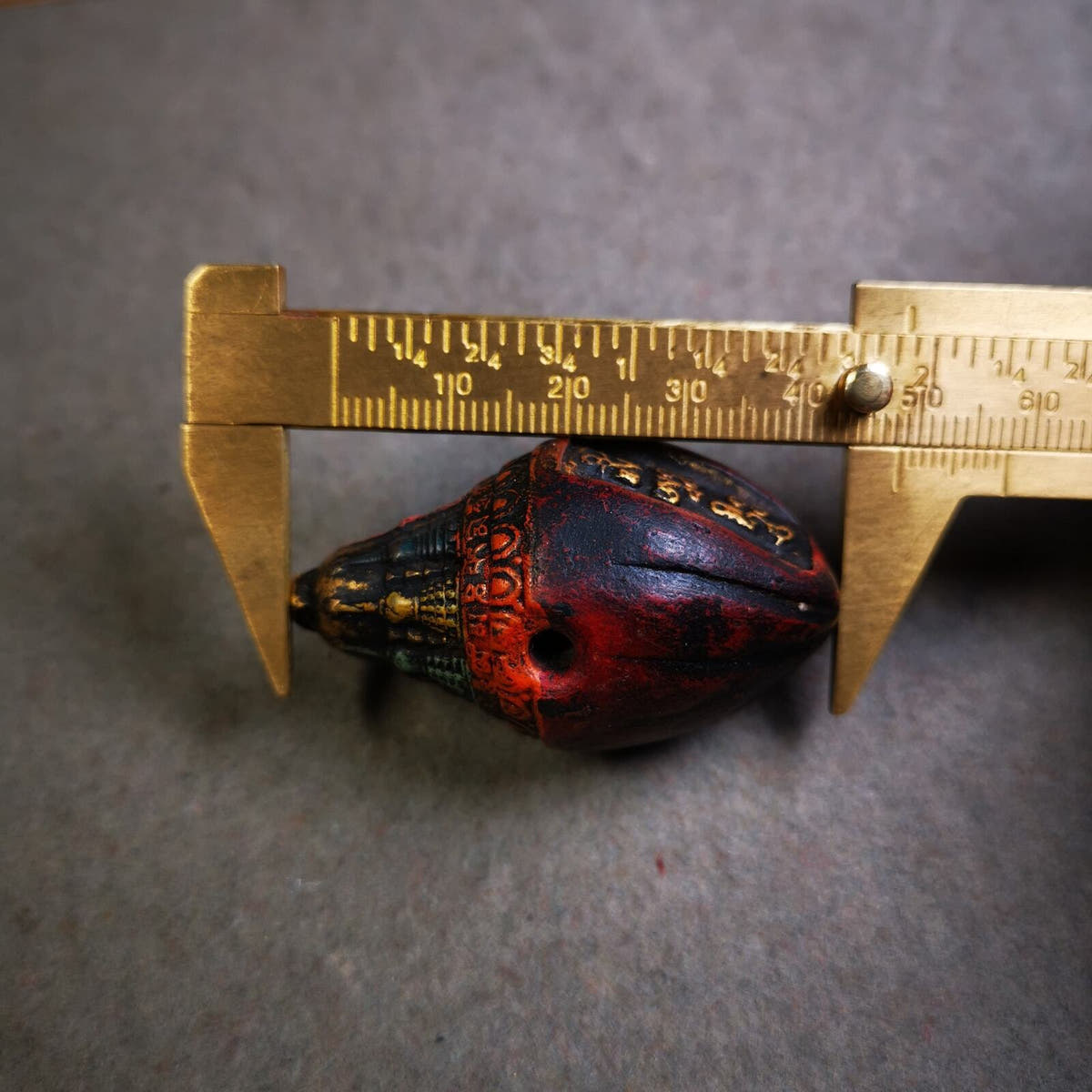 Niang La Tsa Tsa Statue Amulet 1.89" - Tibetan Buddhist amulet, size reference
