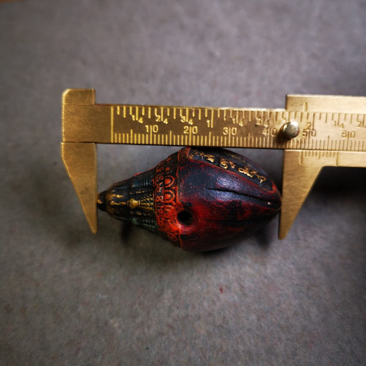 Niang La Tsa Tsa Statue Amulet 1.89" - Tibetan Buddhist amulet, size reference