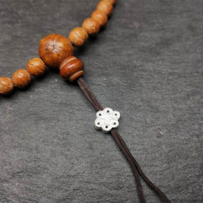 Mala Bead Pendant,Sterling Silver Lucky Knot Bead,Endless Knot - Tibetan Buddhist mala beads, detailed view