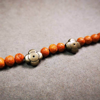 Amulet ,Gesong Flower Marker Spacer Bead for Prayer Bead,Mala - Tibetan Buddhist mala beads, close-up detail