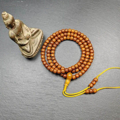 Mala Beads Necklace - Tibetan Buddhist mala beads, close-up detail