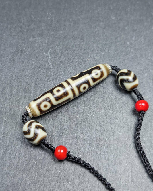 Antique 12 Eyes Dzi Bead Necklace - Tibetan Buddhist bead necklace, front view
