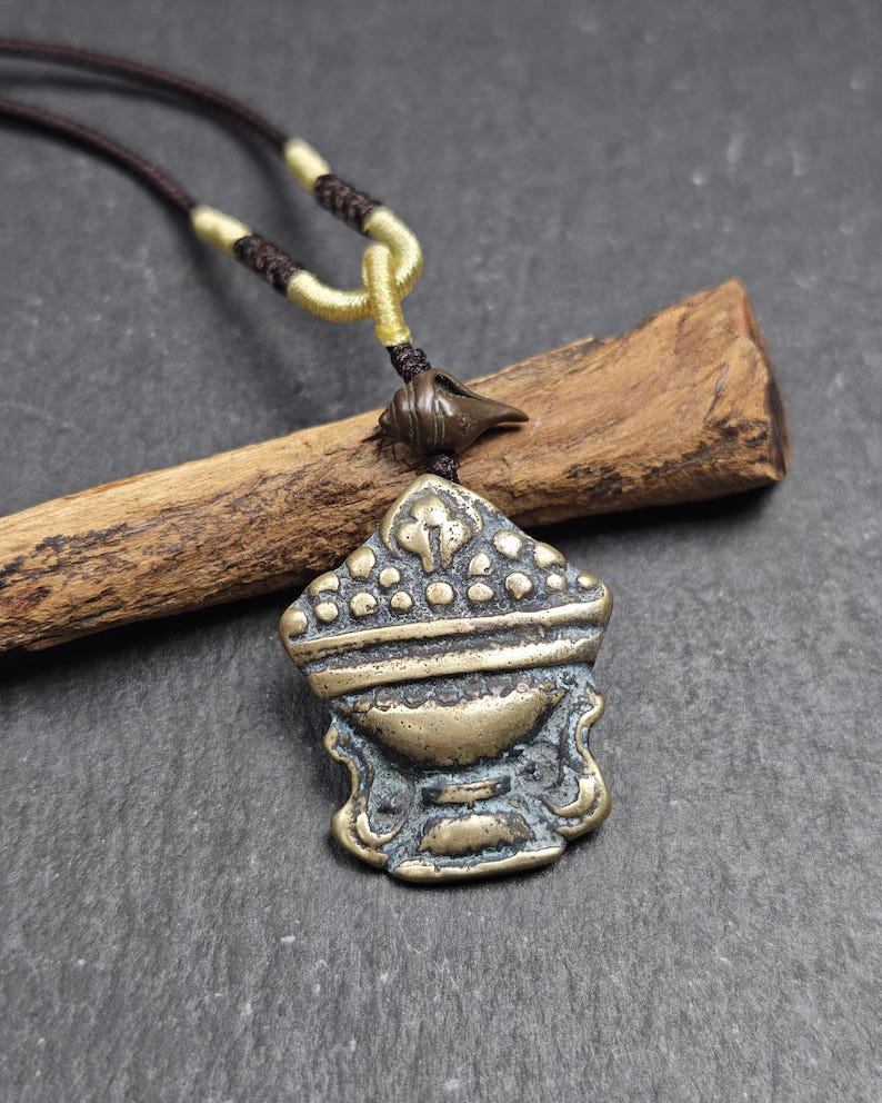 Antique Treasure Vase Amulet - Tibetan Buddhist Talisman - Mani Jewel Charm - Tibetan Buddhist amulet, close-up detail