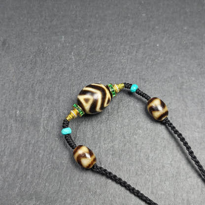 Dalo Dzi Bead Necklace - Round Wave Dzi + Tiger Tooth Dzi - Tibetan Buddhist bead necklace, detailed view