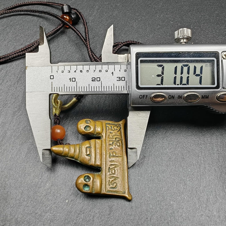 Tibetan Buddhist Amulet - Tibetan Buddhist amulet, size reference
