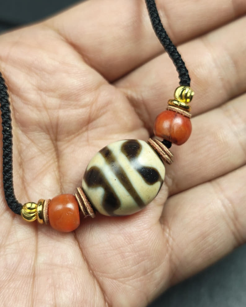 Authentic Tiger Tooth Darlo Dzi Choker - Tibetan Dzi Short Necklace - Tibetan Buddhist bead necklace, close-up detail