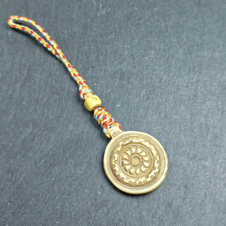 Buddhism Dharma Wheel- Hand-carved Tibetan Amulet 30mm - Tibetan Buddhist amulet, front view