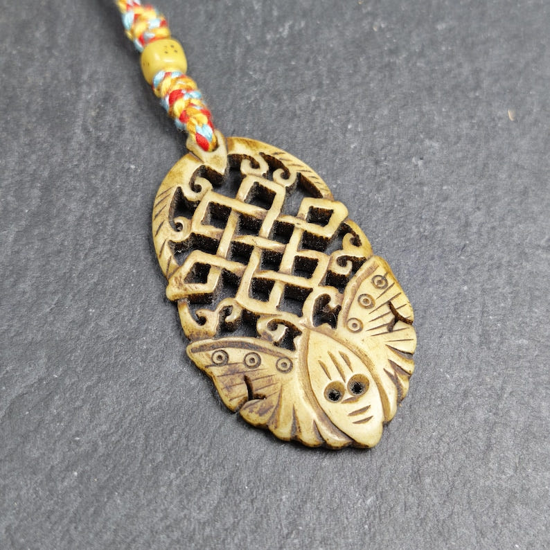 Eternal Knot Endless Knot with Butterfly Hand-carved Amulet - 58*33mm - Tibetan Buddhist amulet, front view