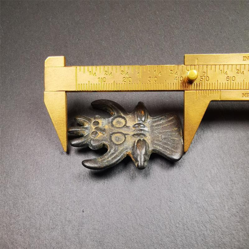 Garuda Amulet - 1.8" - Tibetan Buddhist amulet, size reference