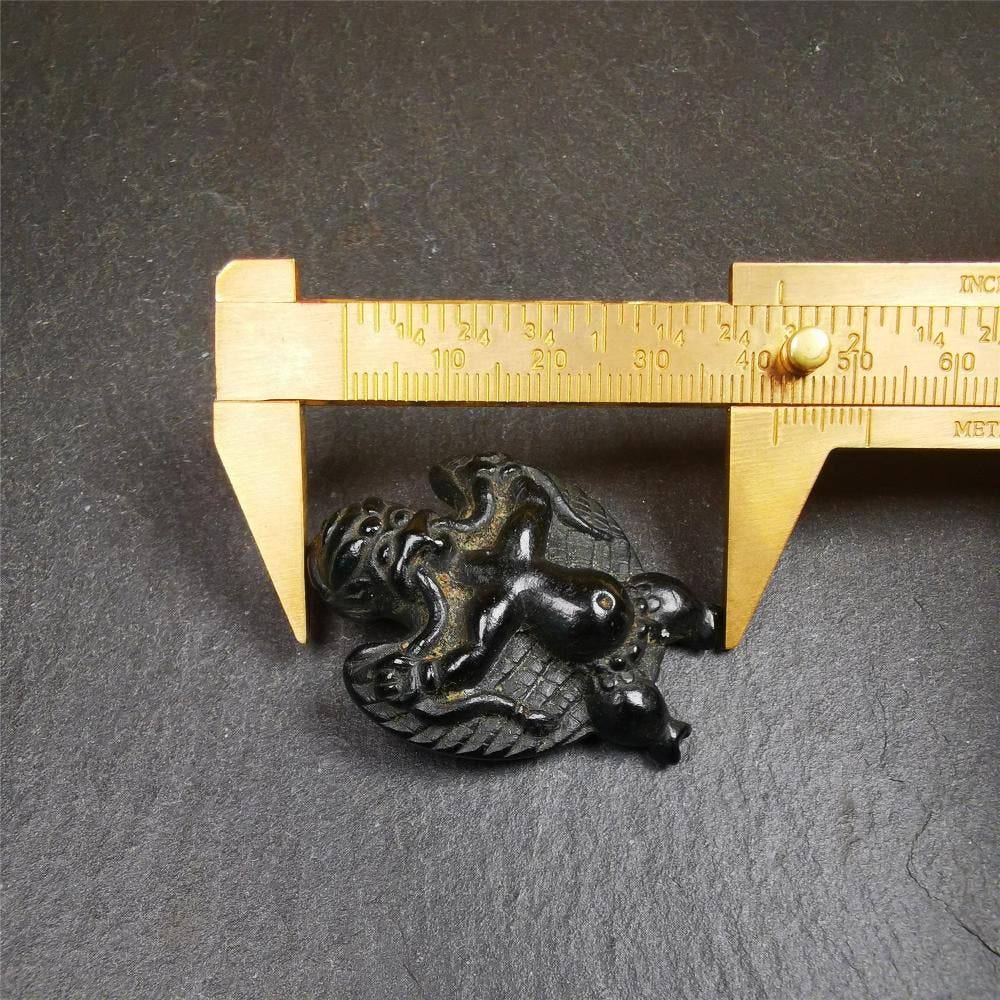 Garuda Amulet - 1.65" - Tibetan Buddhist amulet, size reference