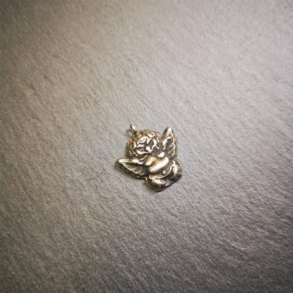 Garuda Amulet Pendant- 0.8" - Tibetan Buddhist amulet, size reference