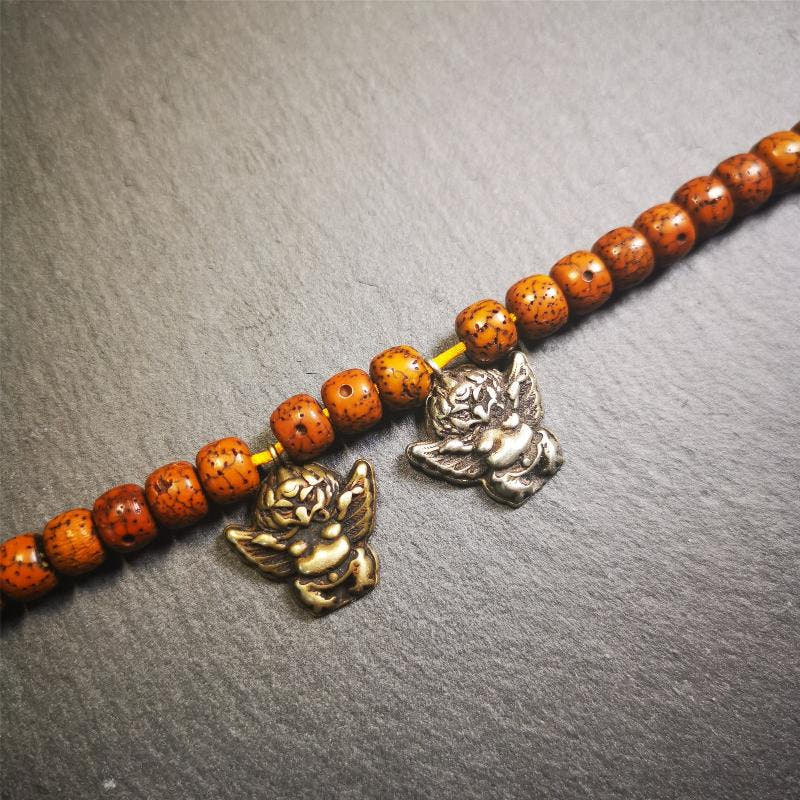 Garuda Amulet Pendant- 0.8" - Tibetan Buddhist amulet, close-up detail