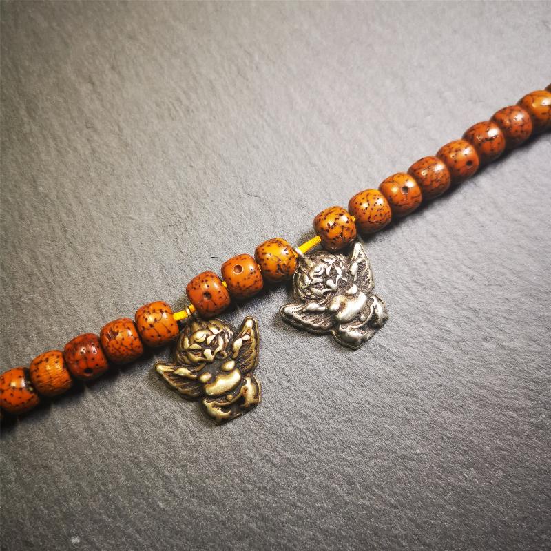 Garuda Amulet Pendant- 0.8" - Tibetan Buddhist amulet, close-up detail