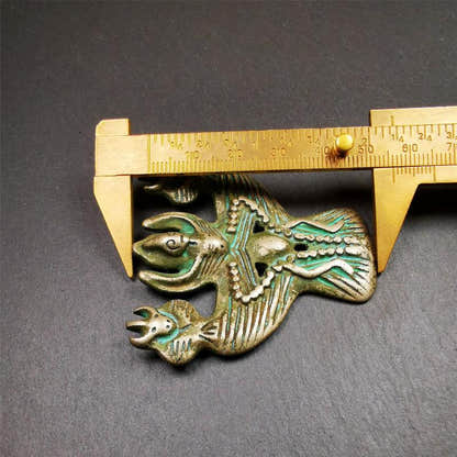 Garuda Amulet - 2.24" - Tibetan Buddhist amulet, size reference