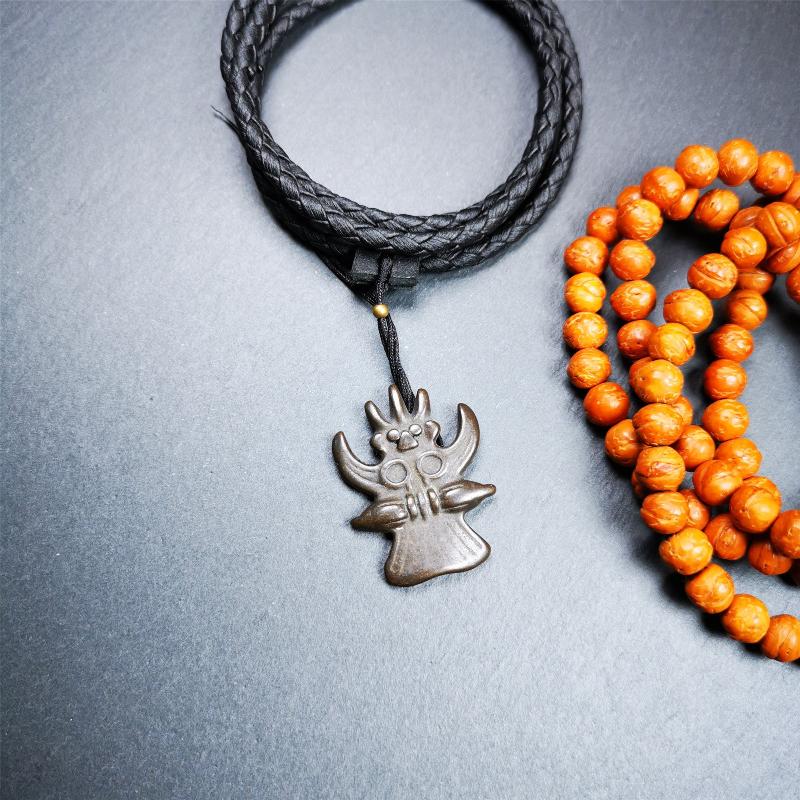 Garuda Amulet - 1.38" - Tibetan Buddhist amulet, close-up detail