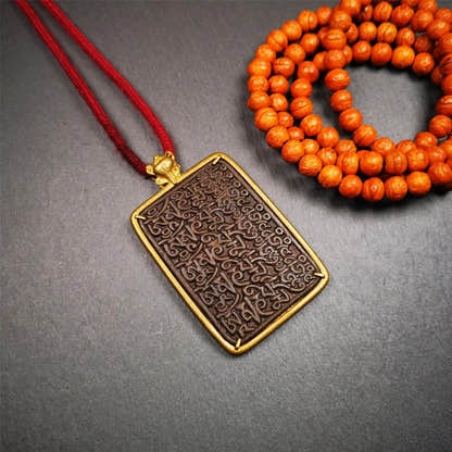 Om Melong Amulet 2.76" - Tibetan Buddhist amulet, front view
