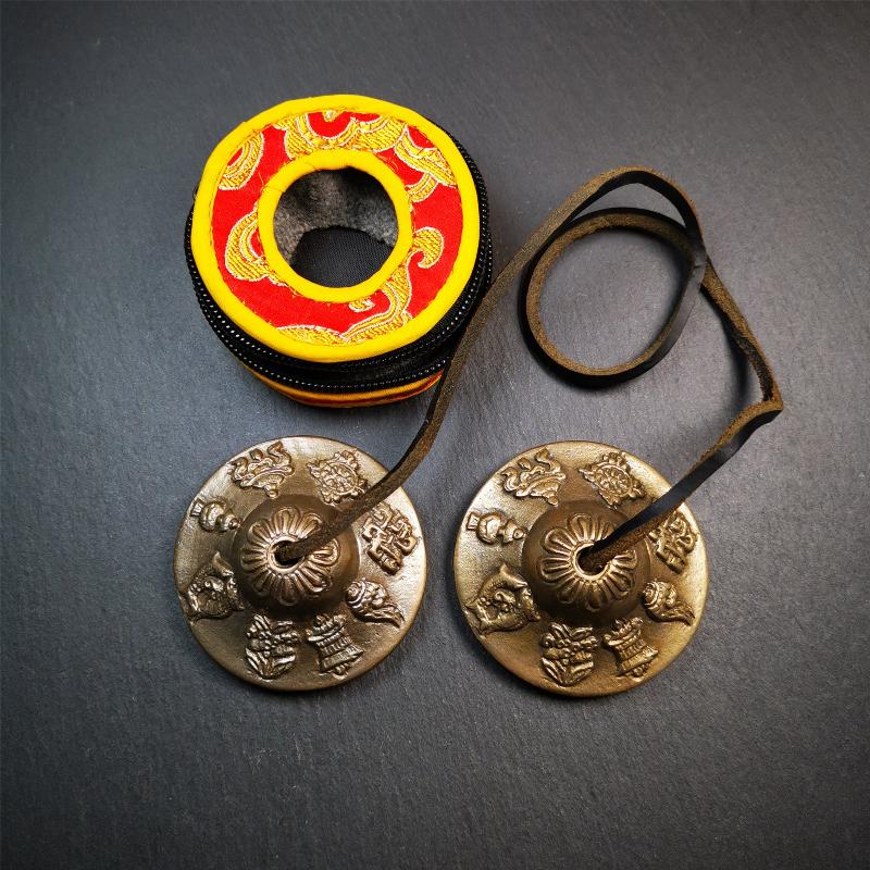 Brass Tingsha Set - Astamangal - 2.6" - Tibetan Buddhist art, close-up detail