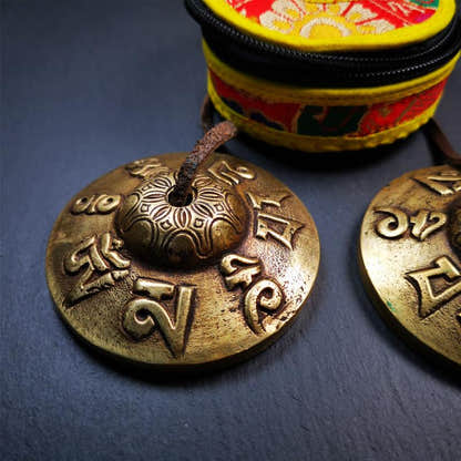 Brass Tingsha Set - OM Mantra - 2.9" - Tibetan Buddhist art, close-up detail