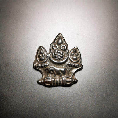 Mani Jewel Wish-Fulfilling Cintamani Badge - Tibetan Buddhist amulet, close-up detail