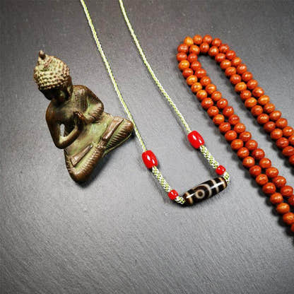 2 Eyed Dzi Bead Necklace - Tibetan Buddhist bead necklace, detailed view
