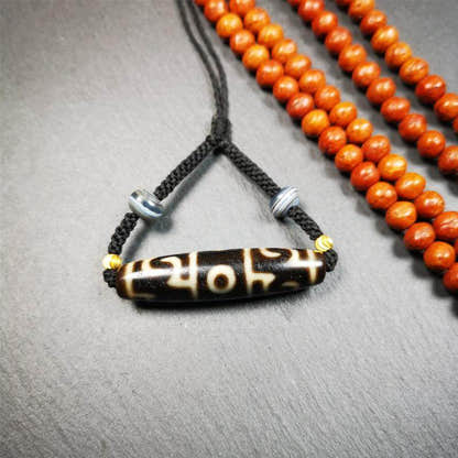 Guru Rinpoche's Ritual Paraphernalia Dzi Bead Necklace - Tibetan Buddhist bead necklace, close-up detail