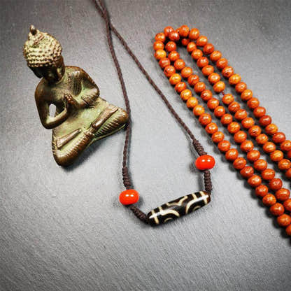 3 Eyed Dzi Bead Necklace - Tibetan Buddhist bead necklace, close-up detail