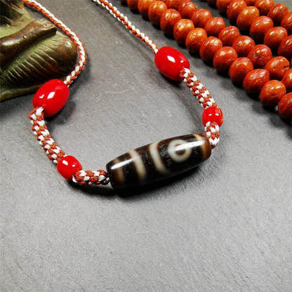 2 Eyed Dzi Bead Necklace - Tibetan Buddhist bead necklace, detailed view