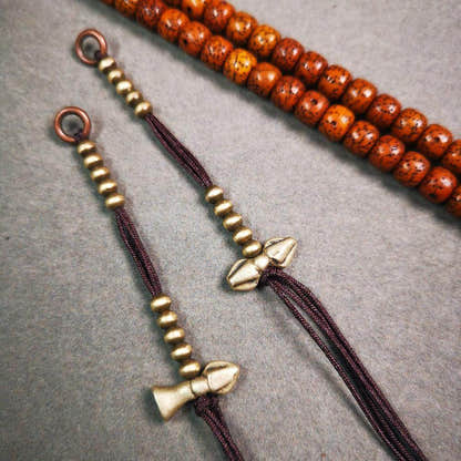 4mm Brass Prayer Bead Counters with Dorje Bell Pendant - Tibetan Buddhist art, close-up detail