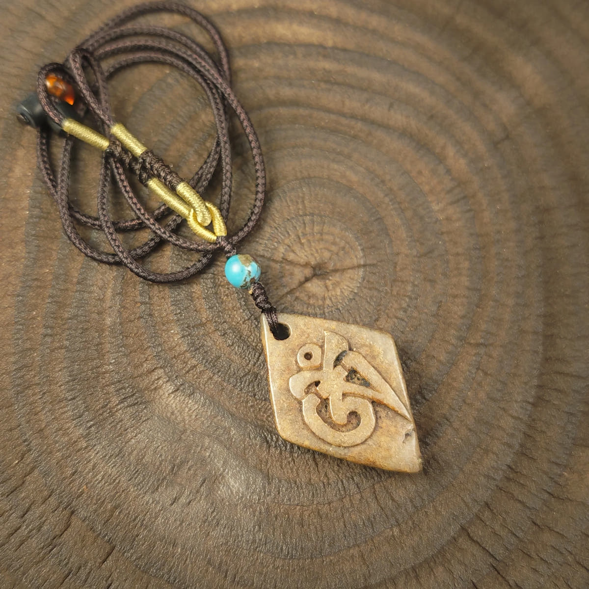 Kapala Amulet Pendant - Hum Syllable - Tibetan Buddhist amulet, front view