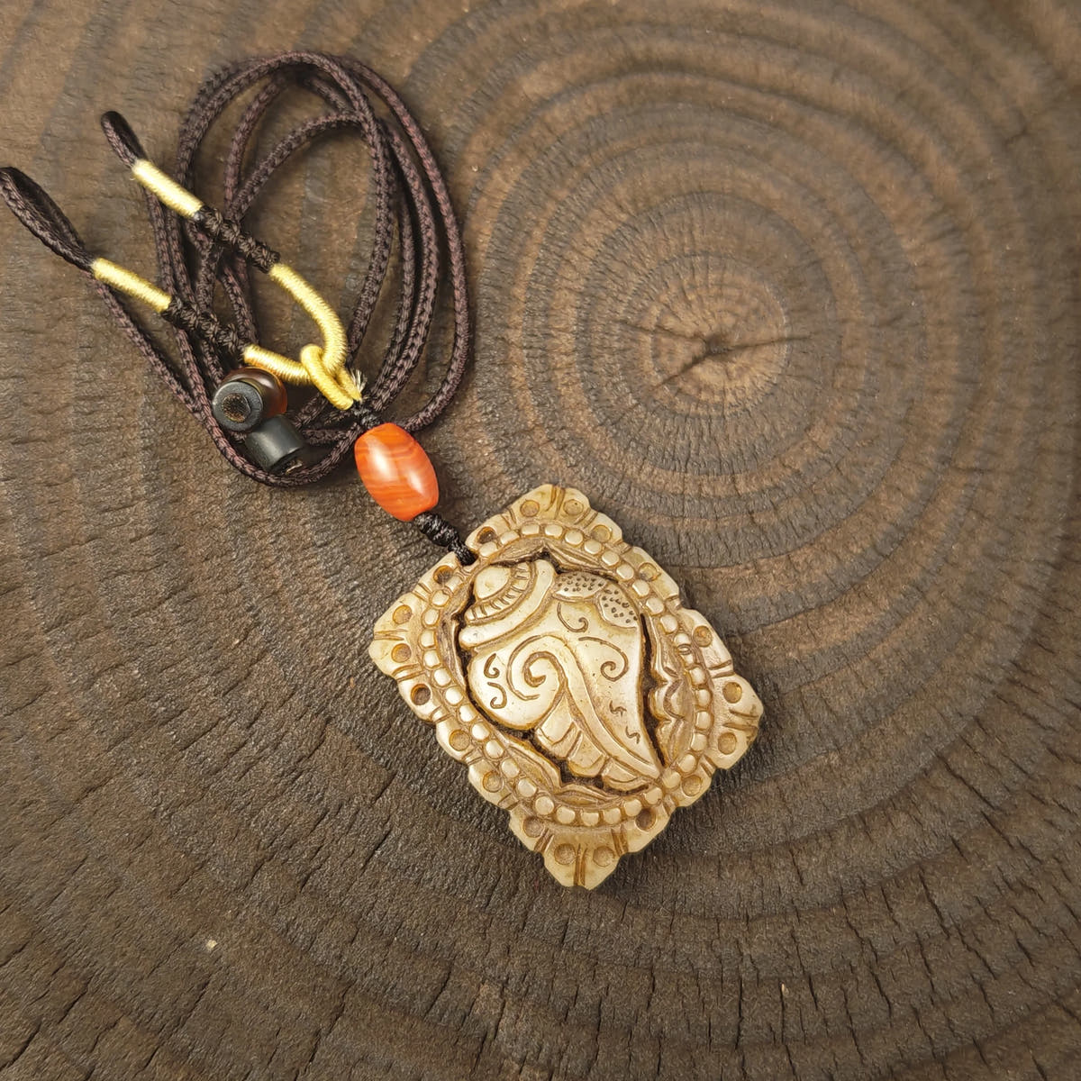 Kapala Amulet Pendant - Conch Shell - Tibetan Buddhist amulet, front view