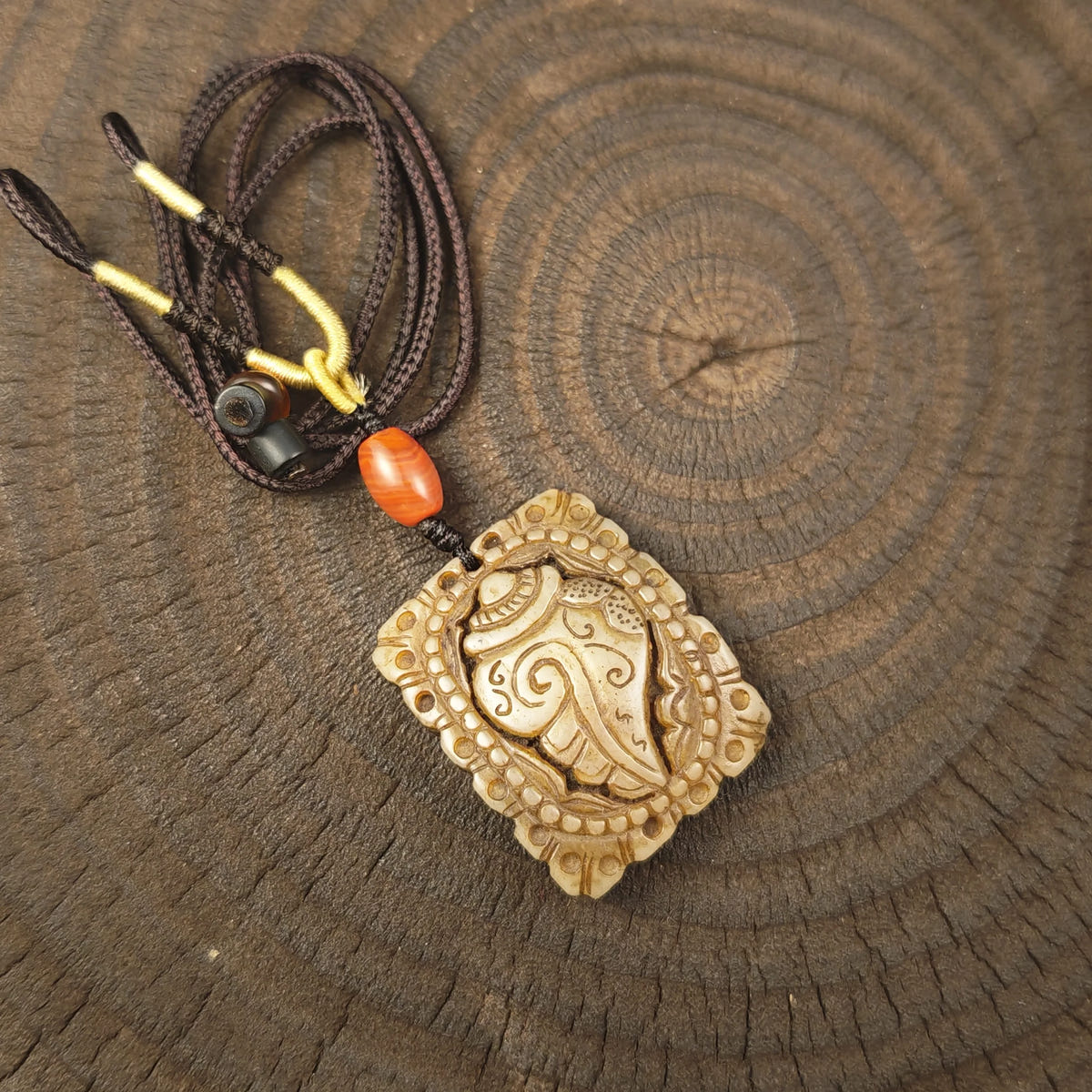 Kapala Amulet Pendant - Conch Shell - Tibetan Buddhist amulet, front view