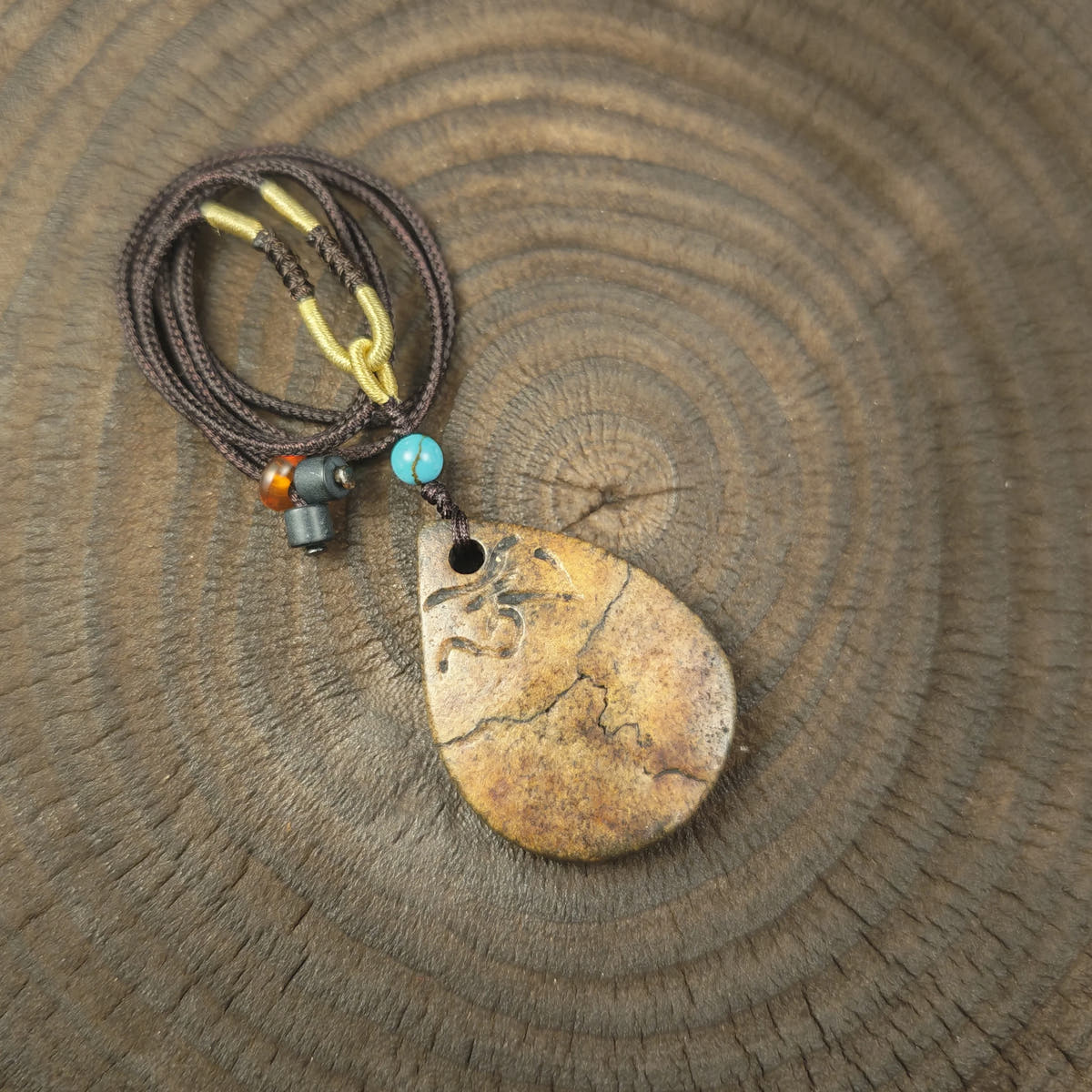 Kapala Amulet Pendant - Hum Syllable - Tibetan Buddhist amulet, front view