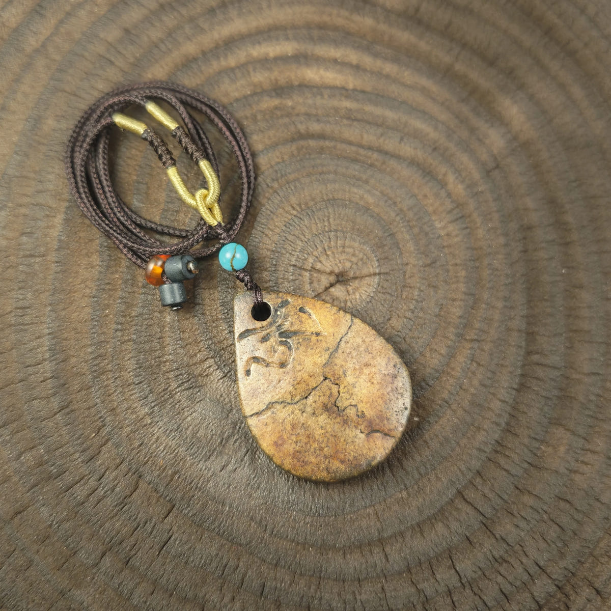 Kapala Amulet Pendant - Hum Syllable - Tibetan Buddhist amulet, front view