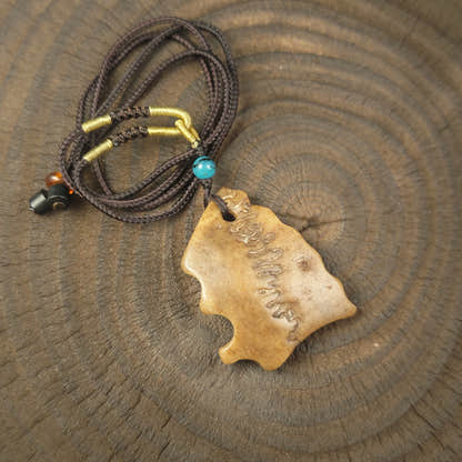 Kapala Amulet Pendant - Free-Form - Tibetan Buddhist amulet, front view